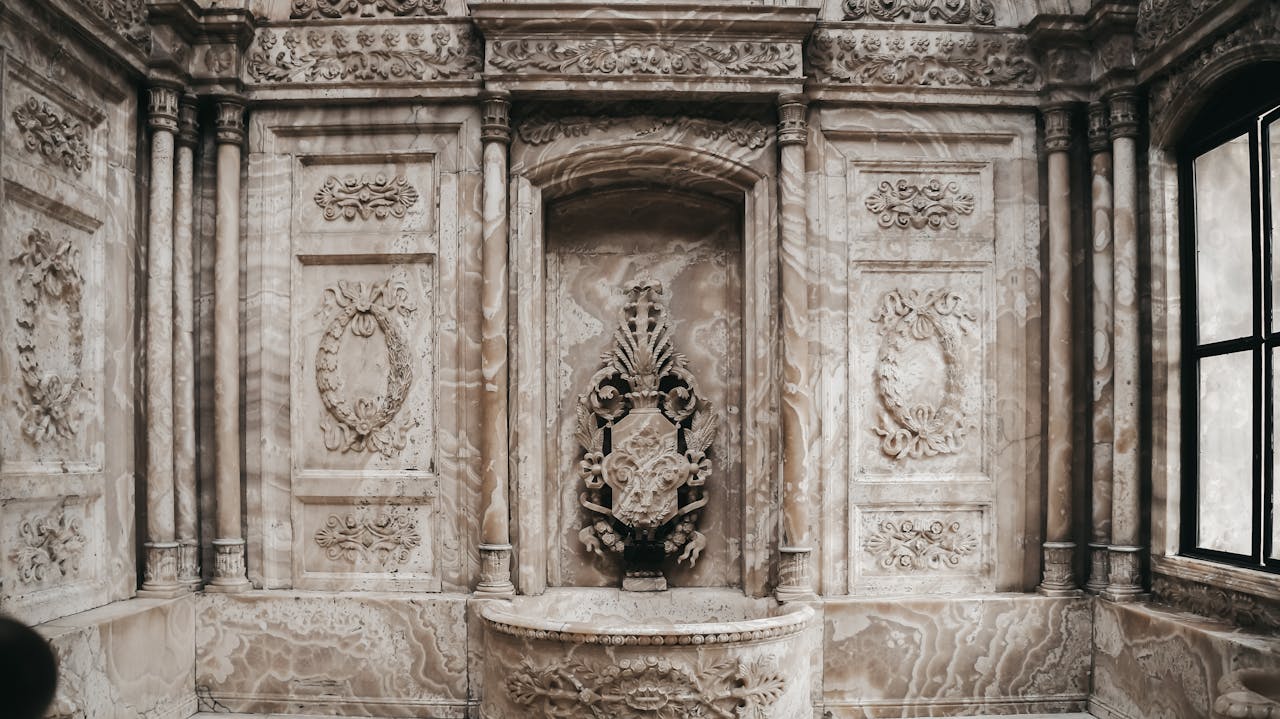Intricate marble carvings and decorations in Dolmabahçe Palace, Istanbul, captured in a warm and classic style.