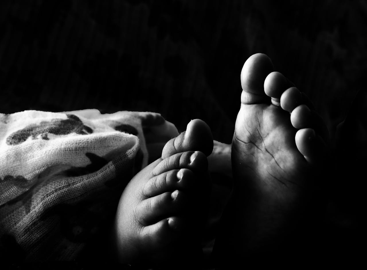 Captivating black and white photo of an infant
